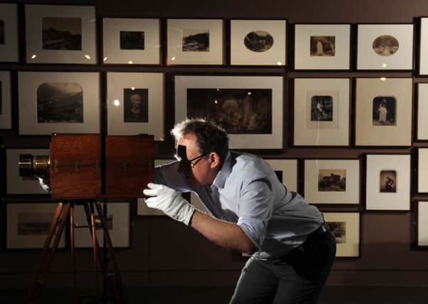 National Media Museum curator Colin Harding with some of the items from the Royal Photographic Society Collection.