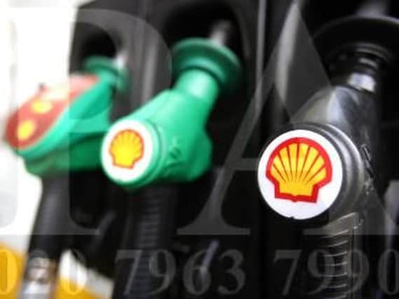 Shell logos on petrol pumps at a petrol station in London, as Royal Dutch Shell insisted its takeover of BG Group heralds the start of a "new chapter"