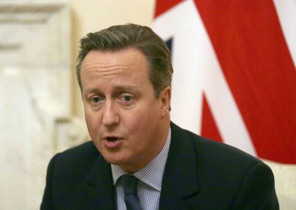 David Cameron has been accused of surrendering Britain's interests to the EU.
