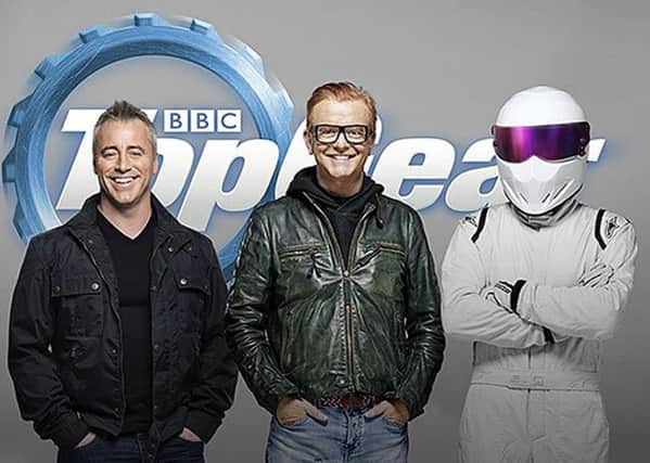 Friends actor Matt LeBlanc with Chris Evans and The Stig, as LeBlanc is to be one of the new presenters of Top Gear