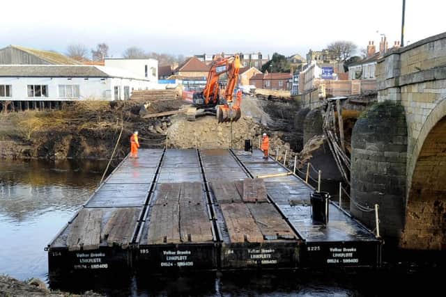Construction work on the temporary footbridge over the River Wharfe to help rejoin the two sides of Tadcaster. Picture: James Hardisty