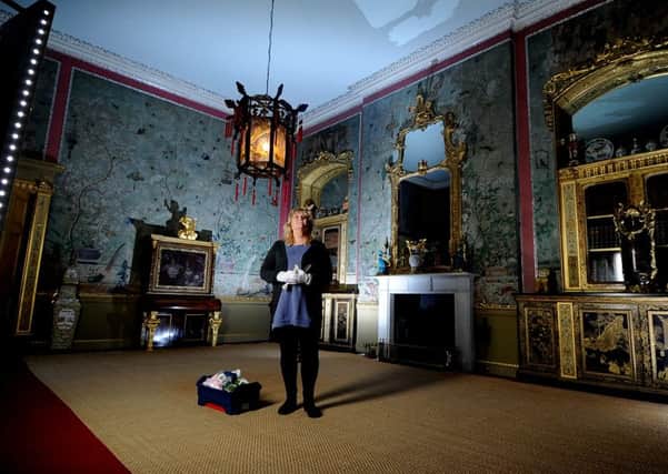 Lynne Crispin, visitor assistant at Temple Newsam House, Leeds, in the Chinese Drawing Room.