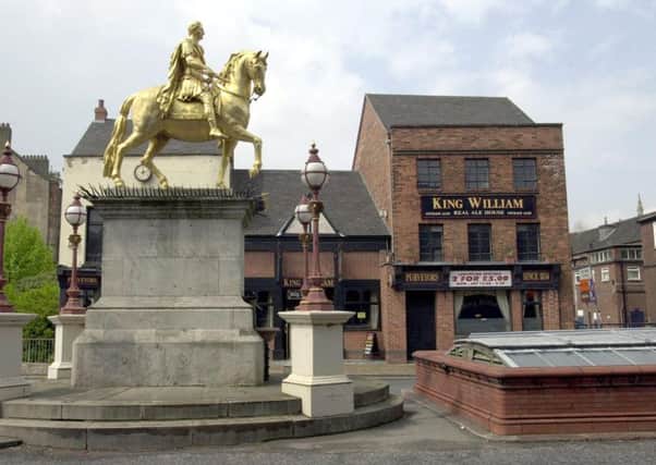 King Billy statue in the Old Town - the famous 1900 men's urinal is to the right