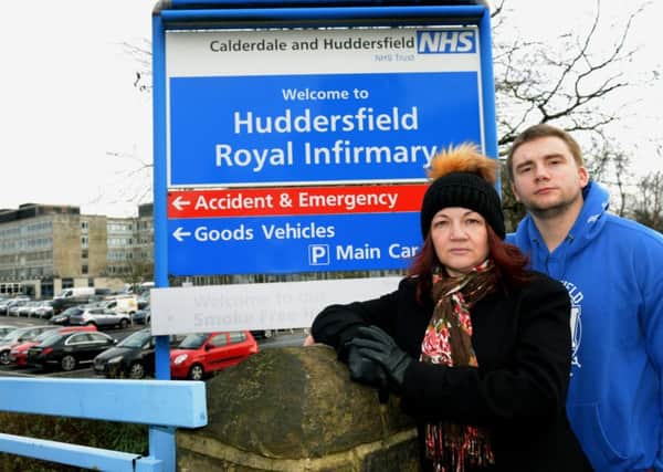 Andria Thompson, with her son Michael Wadsworth outside Huddersfield Royal Infirmary. Twenty five years ago doctors there saved his life.