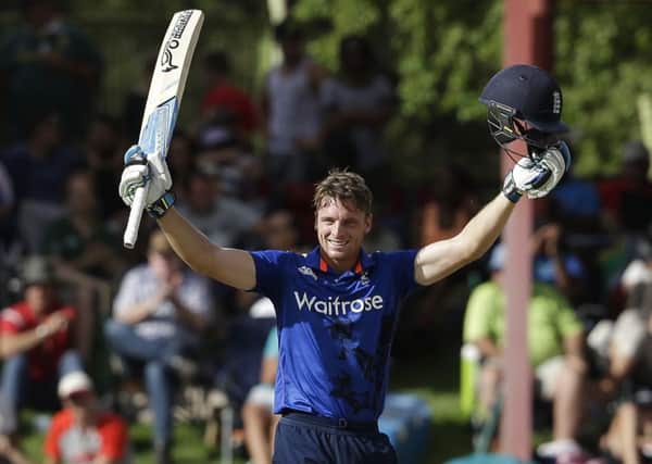 England's Jos Buttler celebrates hitting a century at Bloemfontein against South Africa on Wednesday. Picture: AP Photo/Themba Hadebe.