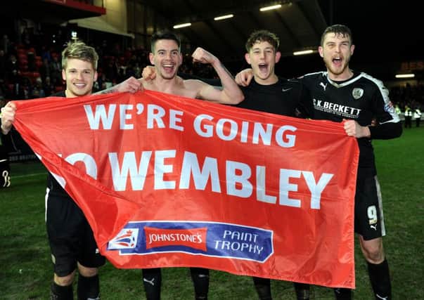FINAL RECKONING: Barnsley's players celebrate going to Wembley. Picture: Jonathan Gawthorpe