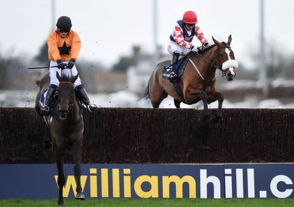 Tea For Two ridden by Lizzie Williams (left) before winning the Kauto Star Novices Chase at Kempton Park on Boxing Day last year. Picture: Andrew Matthews/PA.