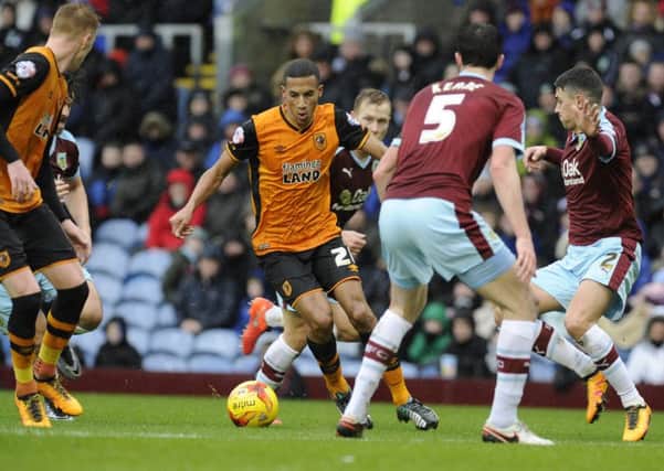 Issac Hayden looks for a way through the Burnley defence. Picture Bruce Rollinson