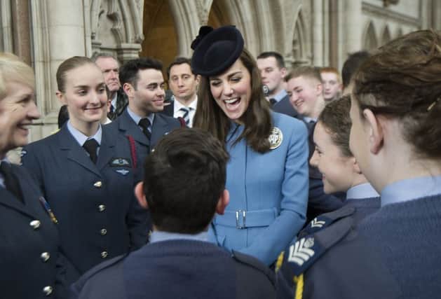 The Duchess of Cambridge (centre) at a reception in the Royal Courts of Justice in London, to mark the RAF Air Cadets 75th anniversary. PRESS ASSOCIATION Photo. Picture date: Sunday February 7, 2016. The Duchess of Cambridge will mark the 75th anniversary year of the RAF Air Cadets at her first official engagement as Honorary Air Commandant of the organisation. The duchess will attend a service at RAF church St Clement Danes, followed by a reception held nearby at the Royal Courts of Justice. See PA story ROYAL Kate. Photo credit should read: Eddie Mulholland/The Daily Telegraph/PA Wire