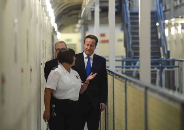 David Cameron visited a prison in 2012