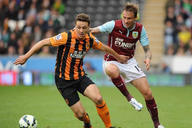 James Chester (left) playing for former club Hull City.