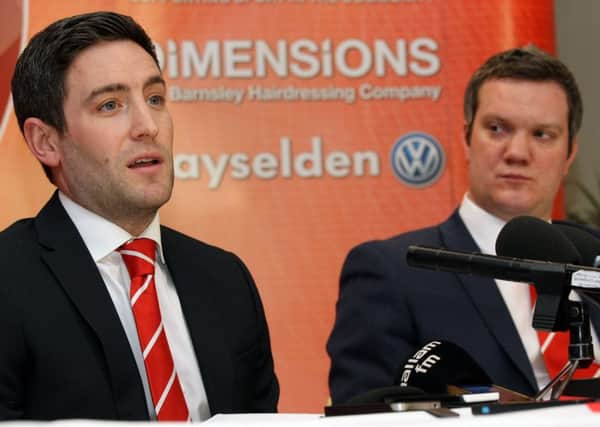 Ben Mansford, right, on the day less than 12 months ago that Lee Johnson, left, was appointed by Barnsley. Johnson has now left the Reds for Bristol City