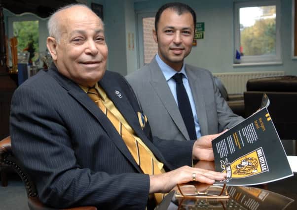 Assem Allam and his son, Ehab.