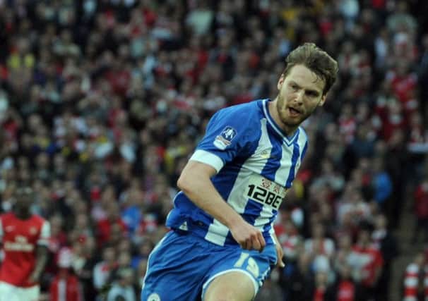 Nick Powell playing for Wigan.