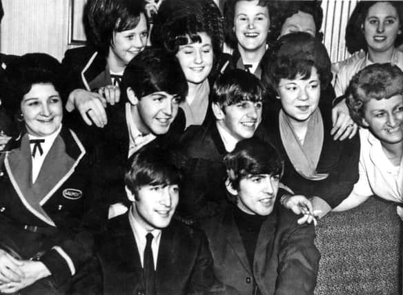 The Beatles on one of their trio of visits to Doncaster. The Fab Four - John, Paul, George and Ringo - are surrounded by female staff from the Gaumont as it was known back in the 1960s.