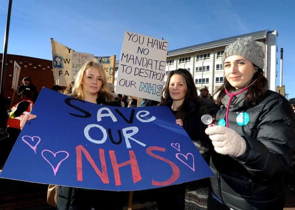 Heather Sharpe, Taryn Kalami, and Aoife Hurley at the second Leeds junior doctor strike. Picture by James Hardisty.