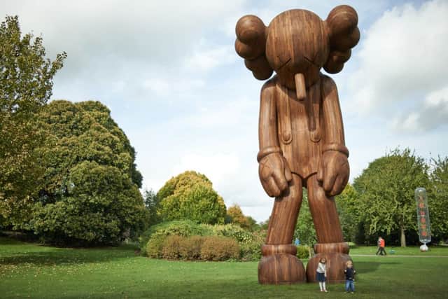 Small Lie, one of the giant mice by the New York-based artist KAWS which have popped up in the Yorkshire Sculpture Park. Picture: Jonty Wilde