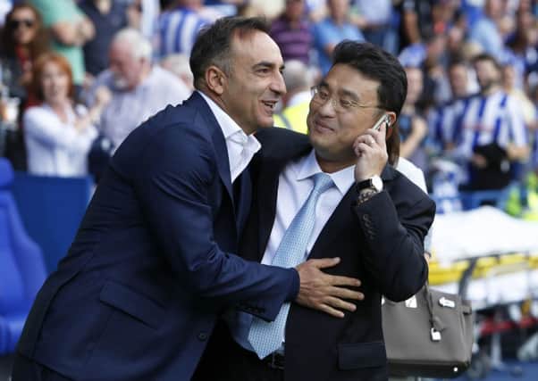 Sheffield Wednesday head coach Carlos Carvalhal and owner Dejphon Chansiri.