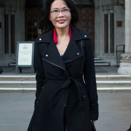 Pauline Chai, the estranged wife of Khoo Kay Peng, non-executive chairman of Laura Ashley Holdings, leaving the High Court in London.  Pic: Stefan Rousseau/PA Wire.