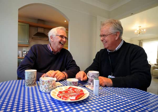 Ted Franklin, 80, of Chapel Allerton, Leeds, with volunteer befriender Bob Burns.
Picture James Hardisty.