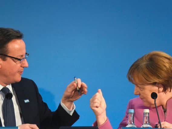 David Cameron and German Chancellor Angela Merkel.