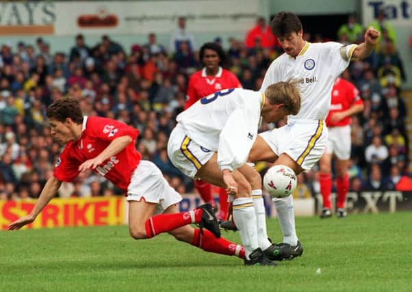 Juninho is knocked off the ball by a combinatrion of Gunnar Halle and Ian Rush at Elland Road in May 1997.