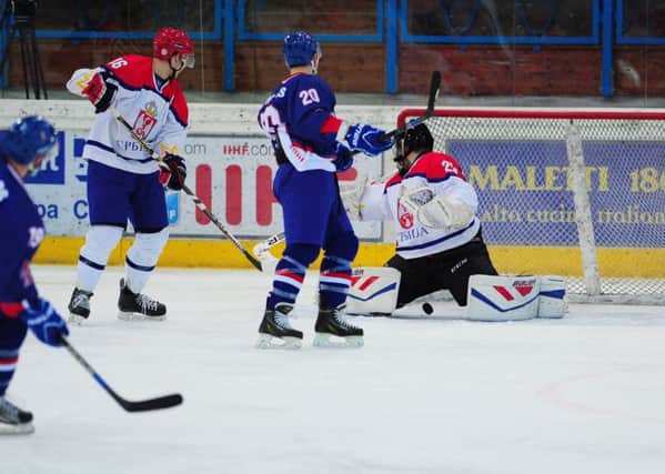 Colin Shields, far left partly hidden, fires in his 33rd international goal for GB to give his side an early lead against Serbia on Saturday. Picture: Colin Lawson.