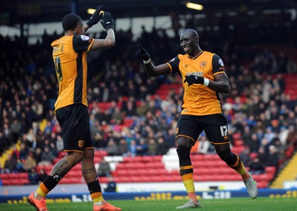 Mo Diame, right, thanks Abel Hernandez for setting him up for the second goal (Picture: Simon Hulme).