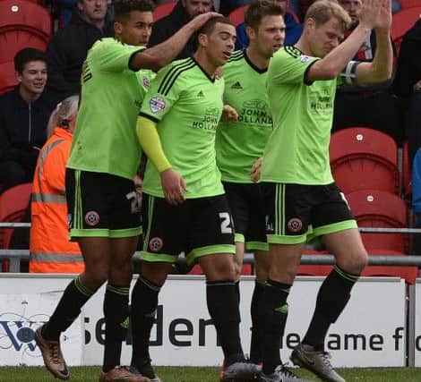 Picture: Andrew Roe/AHPIX LTD, Football, Sky Bet League One, Doncaster Rovers v Sheffield United, Keepmoat Stadium, 13/02/16, K.O 3pm  United's players celebrate Che Adams' goal  Andrew Roe>>>>>>>07826527594