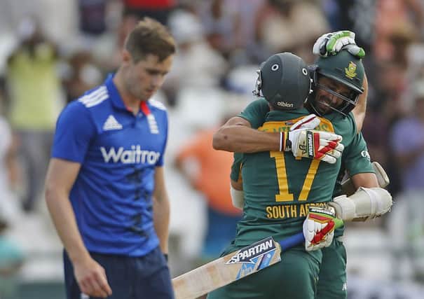 South Africas captain AB de Villiers hugs teammate David Wiese, right, after winning the fifth ODI against England in Cape Town (Picture: Schalk van Zuydam/AP).