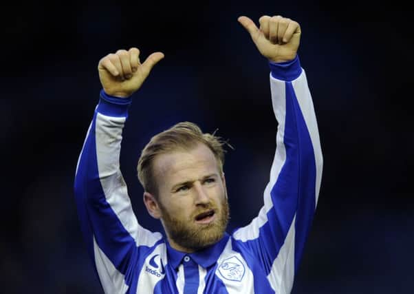 Barry Bannan gives the thumbs up for another three points for the Owls against Brentford. Picture: Steve Ellis