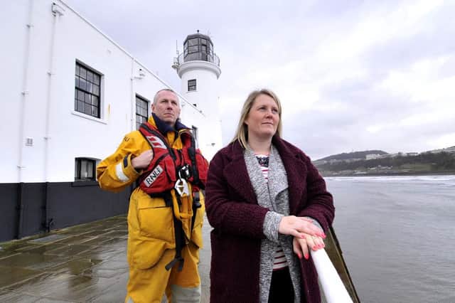 Donna Loveland with Scarborough's RNLI Mechanic Dave Horsley. Inset, Andrew McGeown.