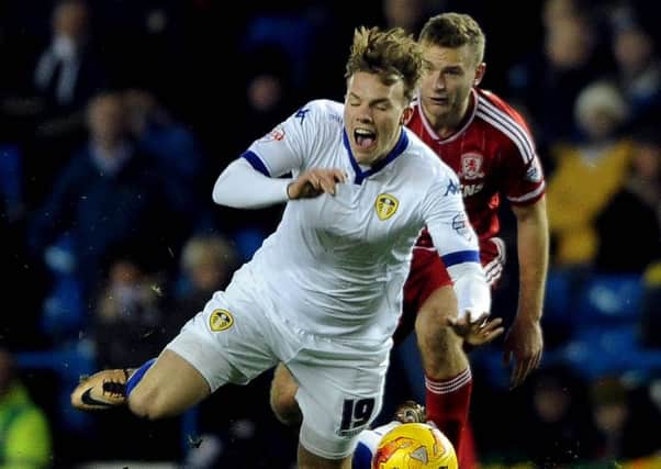 Leeds United's Lee Erwin is fouled by Middlesbrough's Ben Gibson, an indiscretion which led to the Boro man being sent off for two cautionable offences (Picture: James Hardisty.).