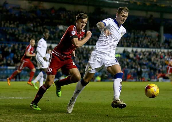 Middlesbrough's Dael Fry and Leeds United's Liam Cooper battle for the ball.