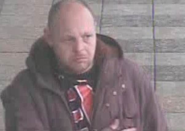 CCTV image of a man police want to speak to about the theft of perfume from Debenhams at Monks Cross shopping centre, York.