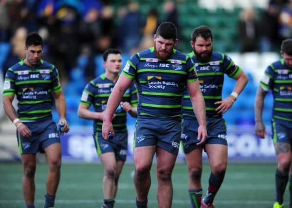 Leeds 
Rhinos players trudge off the pitch after the heavy loss to Widnes.
 (Picture: Jonathan Gawthorpe)