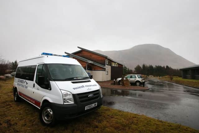 Police activity around the Lochaber Mountain Rescue Team headquarters in Fort William after a major search for Rachel Slater, 24, and Tim Newton, 27, who are missing on Britain's highest mountain, has been suspended due to "treacherous" weather conditions.