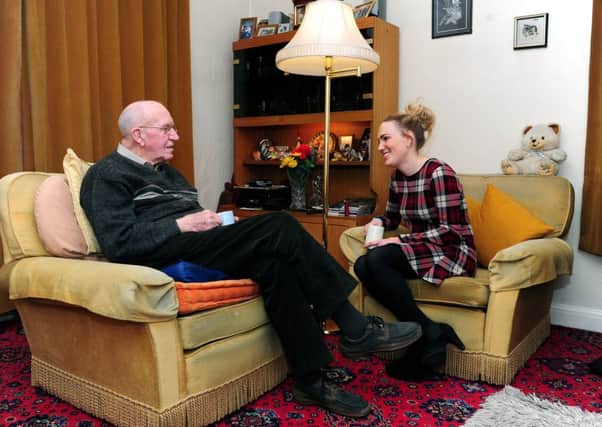 Natalie Kelly 25,  visits Donald Firth at his home in Bradford.

Picture : Jonathan Gawthorpe