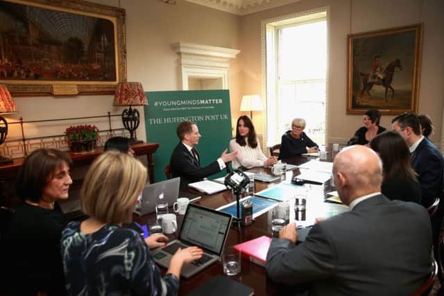 The Duchess of Cambridge guest edits the Huffington Post website in a temporary newsroom set up in Kensington Palace