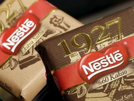 Chocolate packets are displayed in the showroom at the headquarters of Nestle in Vevey, Switzerland