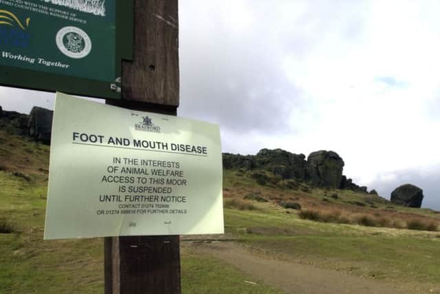 Foot and mouth posters at Ilkley Moor on 10 March 2001.