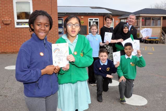 Pupils from  Castleton Primary School and Bankside Primary  launch the childrens version of the citys Children and Young Peoples plan with Coun Lucinda Yeadon,  Executive Member for Children and Families and Nigel Richardson, director of Children's Services. Picture Tony Johnson