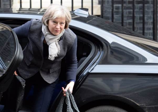 Home Secretary Theresa May arrives at 10 Downing Street in London ahead of a Cabinet meeting to discuss David Cameron's newly-secured EU reform deal. PRESS ASSOCIATION Photo. Picture date: Saturday February 20, 2016. See PA story POLITICS EU. Photo credit should read: Stefan Rousseau/PA Wire