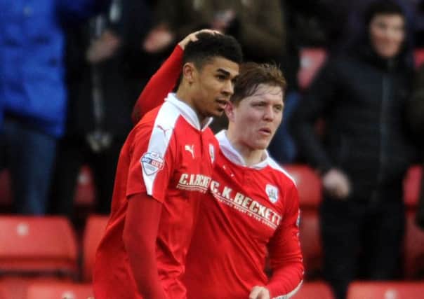 Barnsley's goalscorer Ashley Fletcher, left, is congratulated by team-mate Alfie Mawson (Picture: James Hardisty).
