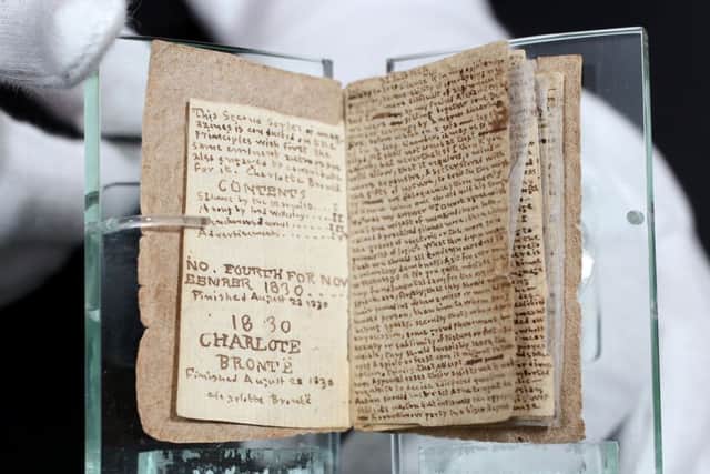 A small book written by Charlotte Bronte in 1830, when she was 14 years old, pictured at the Bronte Parsonage Museum, Haworth , West Yorkshire. It forms part of a new exhibition for 2016 and is part of this year's celebrations to mark the 200th anniversary, on 21 April, of Charlotte's birth. (Picture: Lorne Campbell / Guzelian).