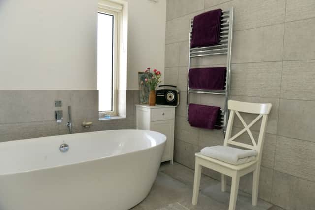 Rob splashed out on the bathroom with bath from Porcelanosa