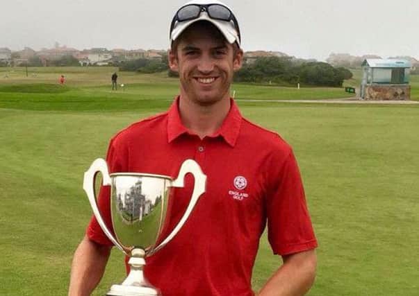 Meltham's Jamie Bower with the Southern Cape Open trophy.