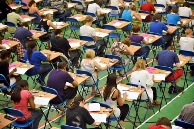 A-level students sitting an exam.
