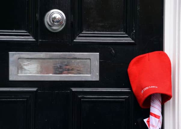 A 'Vote Leave' hat and umbrella placed by a campaigner outside the home of Mayor of London Boris Johnson in Islington, London, after Prime Minister David Cameron issued a last-ditch appeal to Mr Johnson not to join the campaign for Britain to leave the European Union. PRESS ASSOCIATION Photo. Picture date: Sunday February 21, 2016. With the London mayor set to end months of speculation over which side he will back, Mr Cameron said it would be a "wrong step" for Mr Johnson to link up with Ukip leader Nigel Farage and Respect's George Galloway in the "out" camp. See PA story POLITICS EU. Photo credit should read: Stefan Rousseau/PA Wire