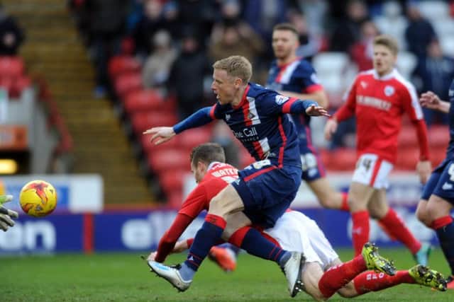 Doncaster Rovers' Craig Alcock gets a shot in on goal in his side's 1-0 defeat to Barnsley. Picture: James Hardisty.